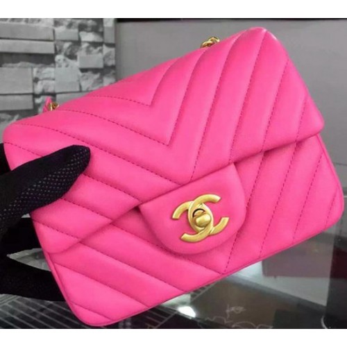 Chanel Classic mini borsa con patta Chevron in pelle di montone A68748 rosa