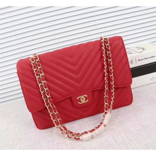 Chanel Maxi borsa classica trapuntata con patta rossa motivo Chevron Cannage A58601 oro