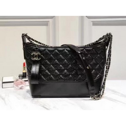 Borsa a tracolla media Chanel in pelle di montone A93826 nera