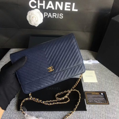 Borsa a tracolla con patta Chanel WOC in pelle di vitello blu scuro A33814 oro