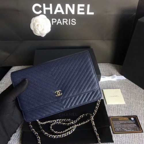 Borsa a tracolla con patta Chanel WOC in pelle di vitello blu scuro A33814 argento