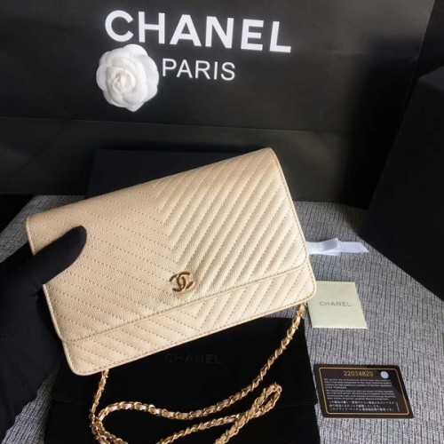 Borsa a tracolla con patta Chanel WOC in pelle di vitello dorata A33814 oro