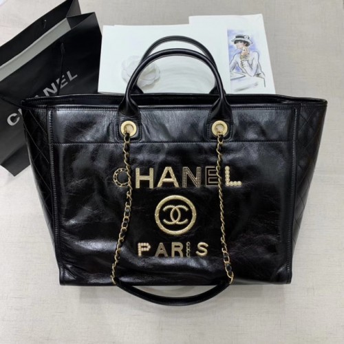 Borsa shopping tote in pelle bovina Chanel A66942 nera
