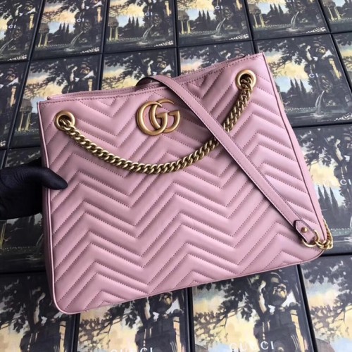 Borsa a tracolla matelasse media Gucci GG Marmont 453569 rosa