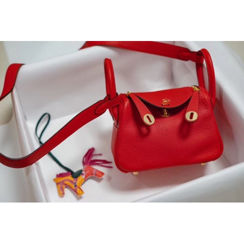Borsa in pelle Hermes mini Lindy Togo LD19 metallo tono rosso e oro