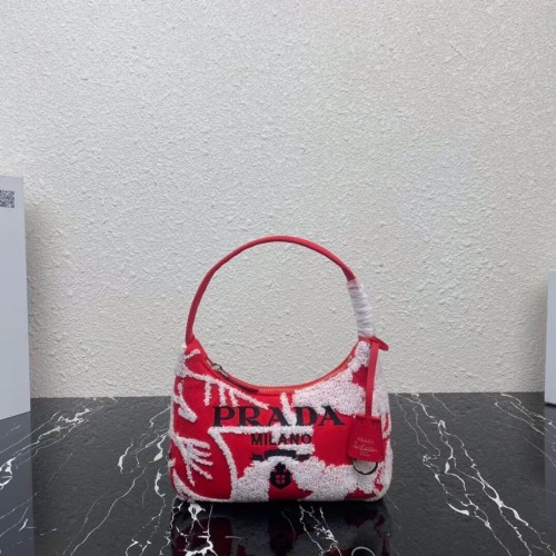 Prada Re-Edition 2000 borsa mini drill ricamata 1NE515 rossa