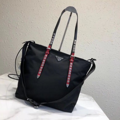 Borsa Prada in pelle Saffiano e nylon 1BG212 nera e rossa