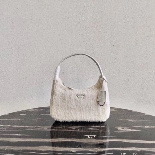 Borsa tote Prada Shearling mini 1NE515 bianca